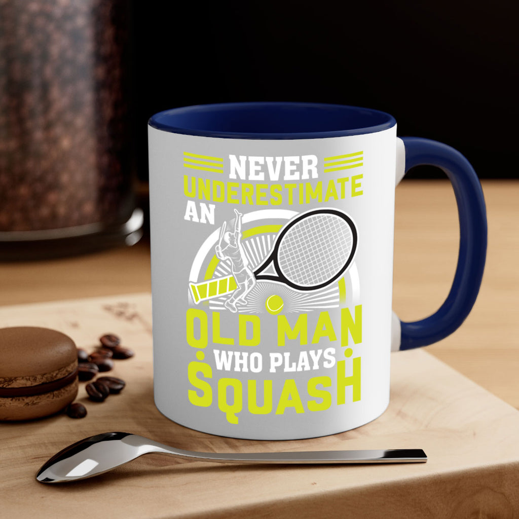 never underestimate a squash player 574#- tennis-Mug / Coffee Cup